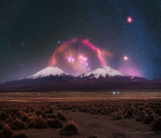 Celestial Colors: Barnard’s Loop Over Twin Volcanoes